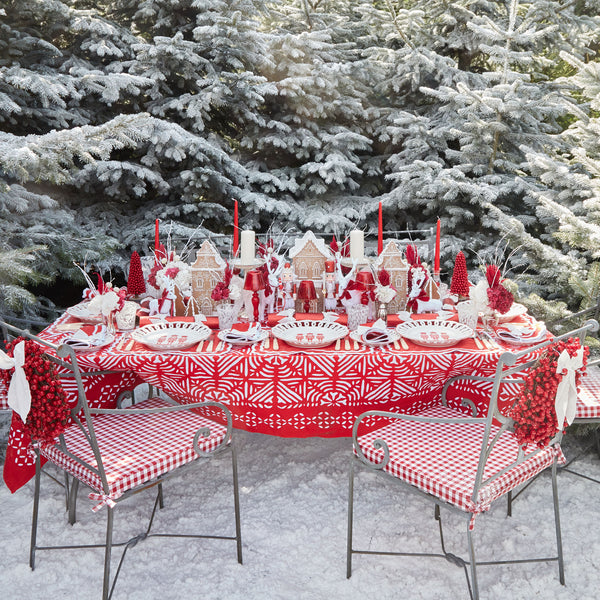 Create a captivating holiday table with the Gretel Applique Red Tablecloth, an elegant and delightful piece adorned with festive applique, perfect for Christmas celebrations.