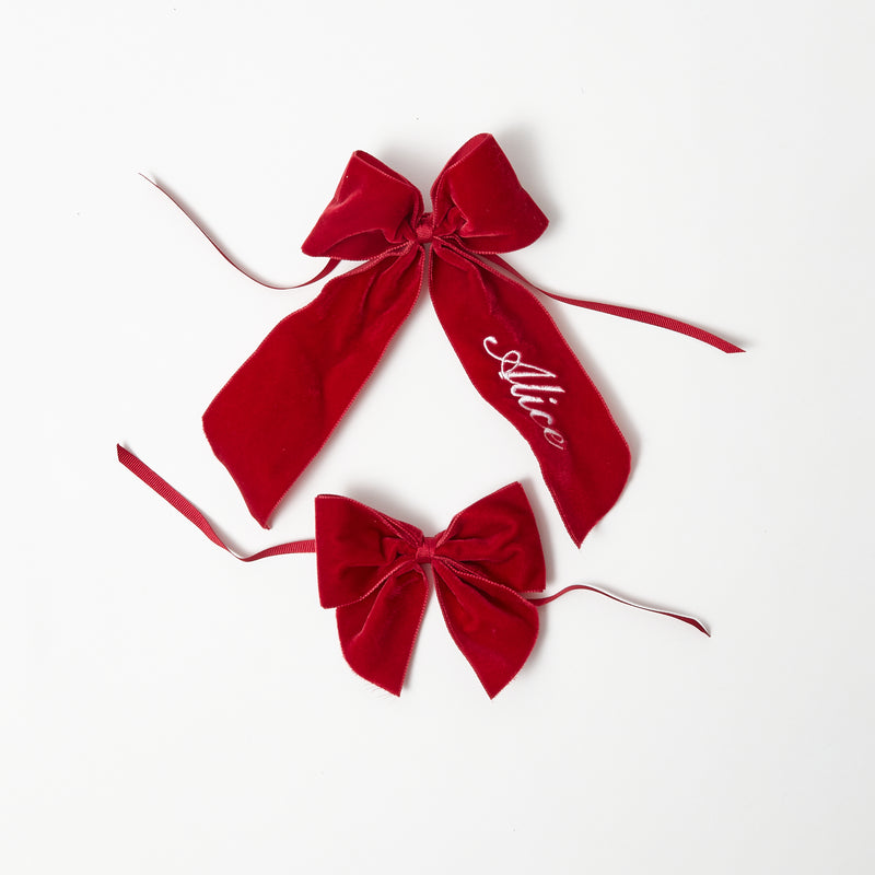Personalize your dining space with the Personalisable Berry Red Napkin Bow, a charming and festive bow that lets you add your name or a special message to your table decor.