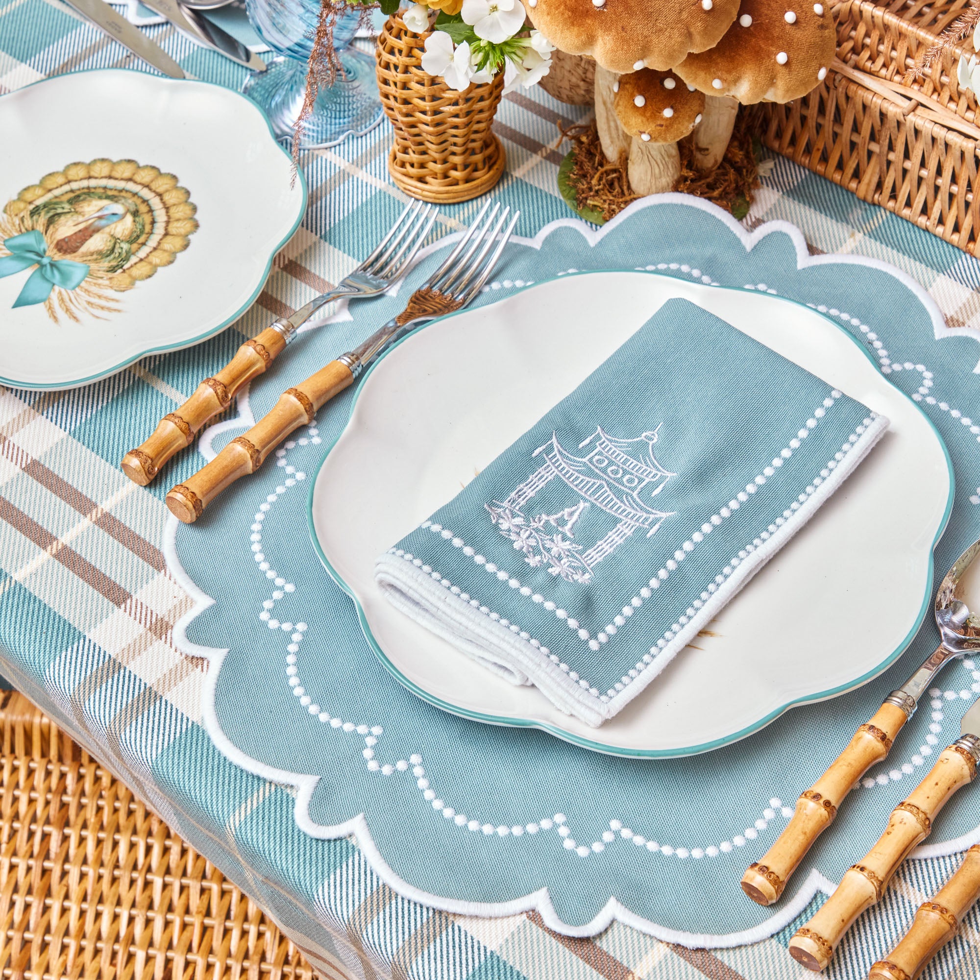 Four elegant napkins showcasing the delightful Mariana Duck Egg style.
