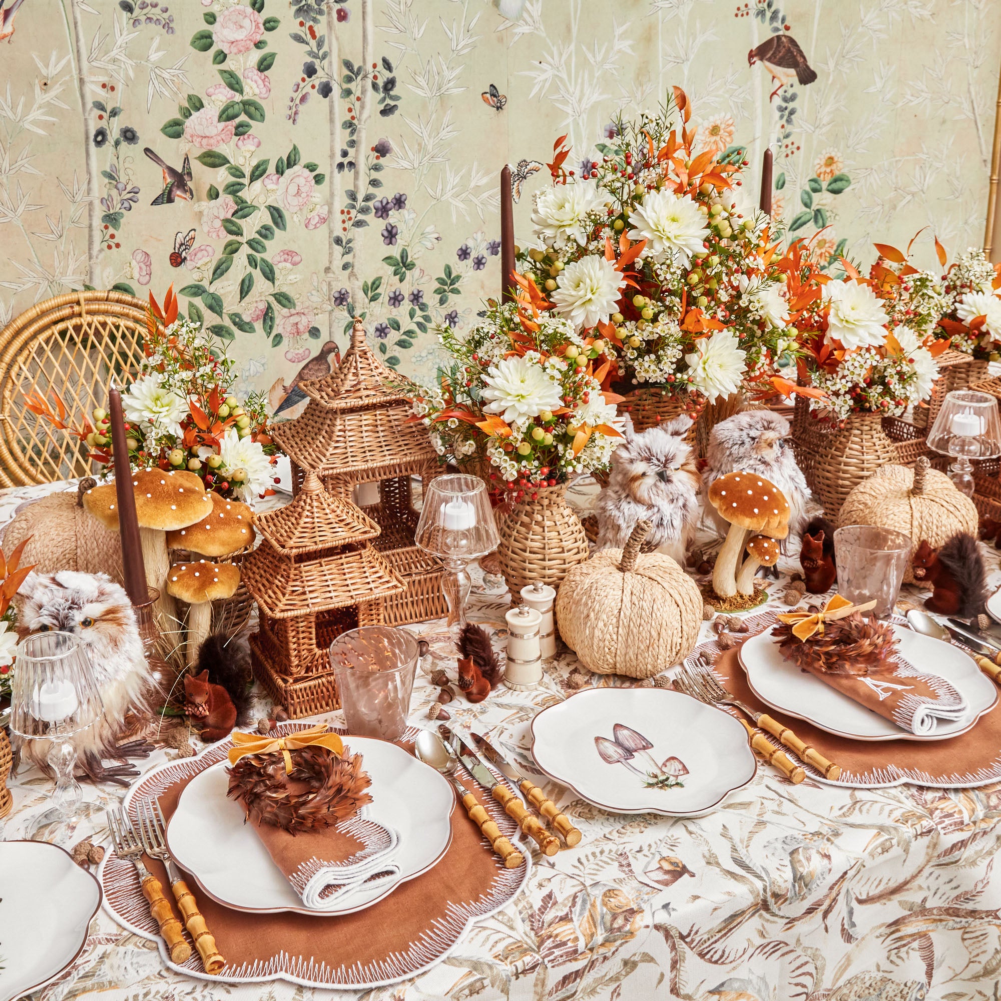 Eight dinner and eight starter plates showcasing intricate scalloped mushroom patterns.