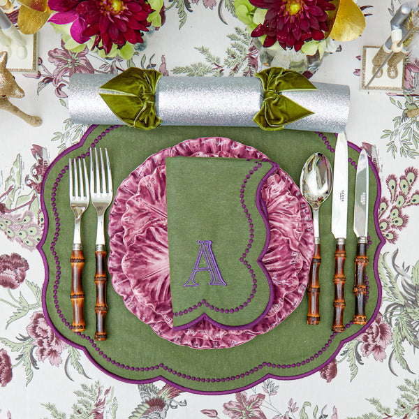 Eloise Green & Purple Napkins (Set of 4) are the perfect blend of sophistication and charm for your dining decor.