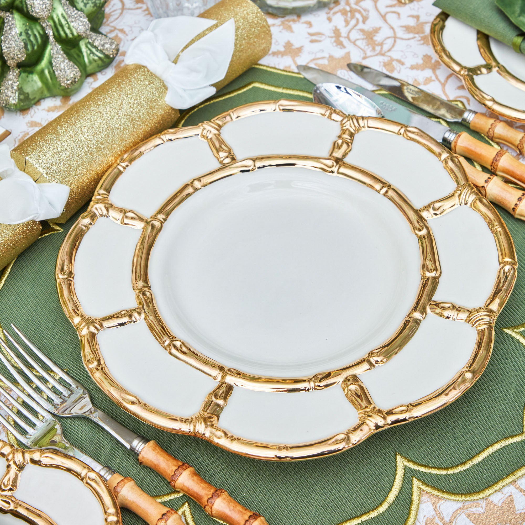 Bring a touch of opulence to your table with these Gold Petal Bamboo Dinner Plates.