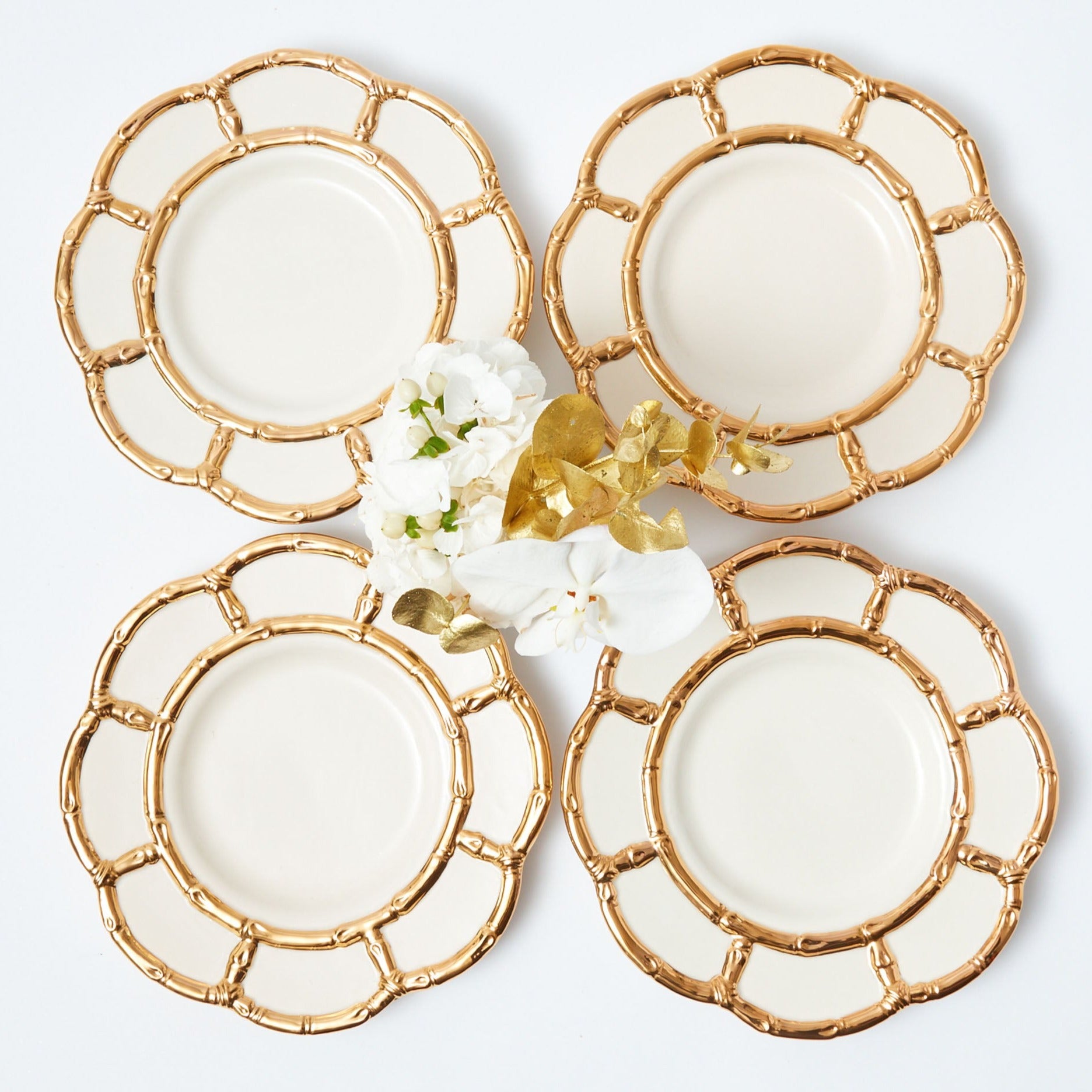 Enhance your dining experience with these luxurious Gold Petal Bamboo Dinner Plates.