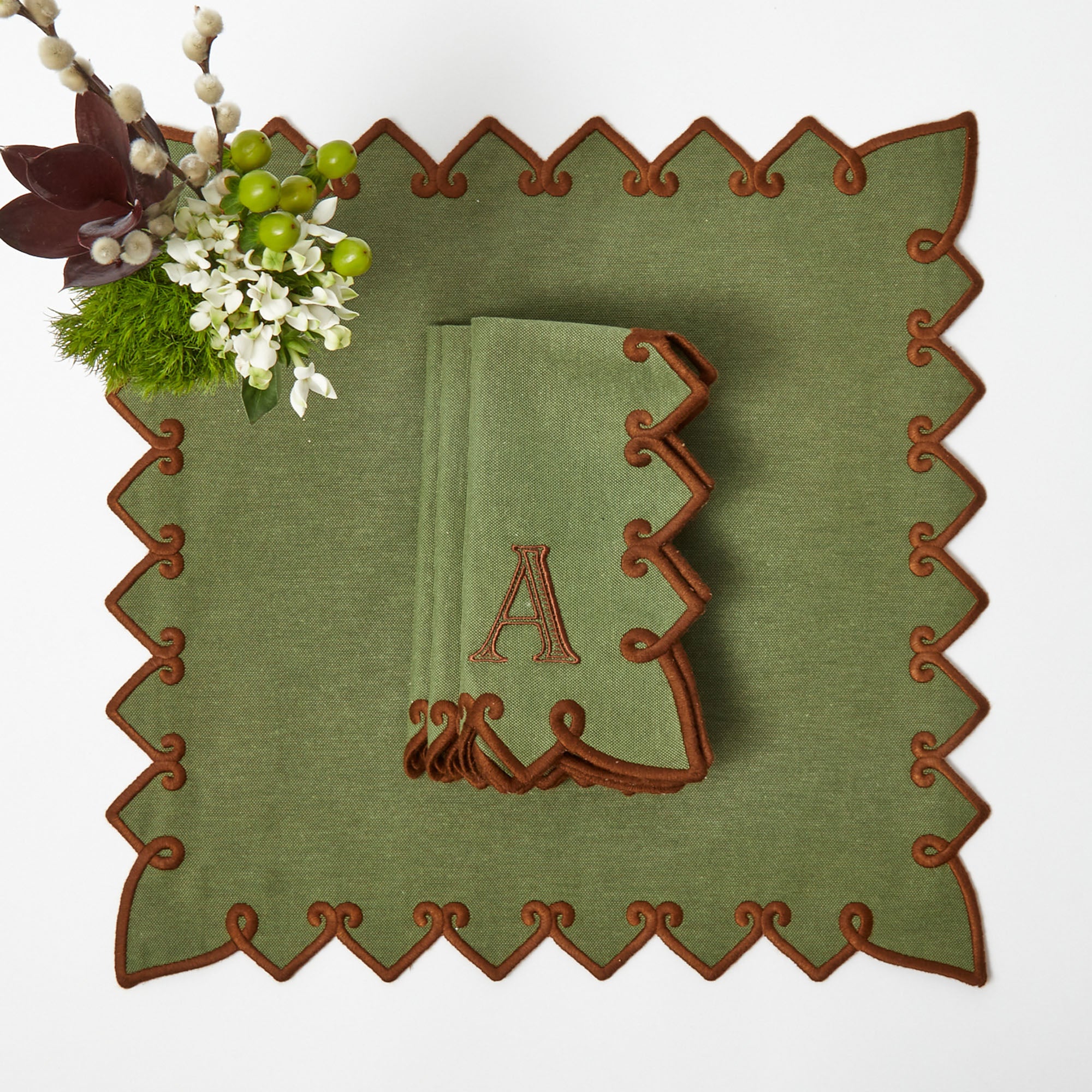 Complement your dining experience with Angelina Forest Green & Brown Placemats & Napkins for a serene ambiance.