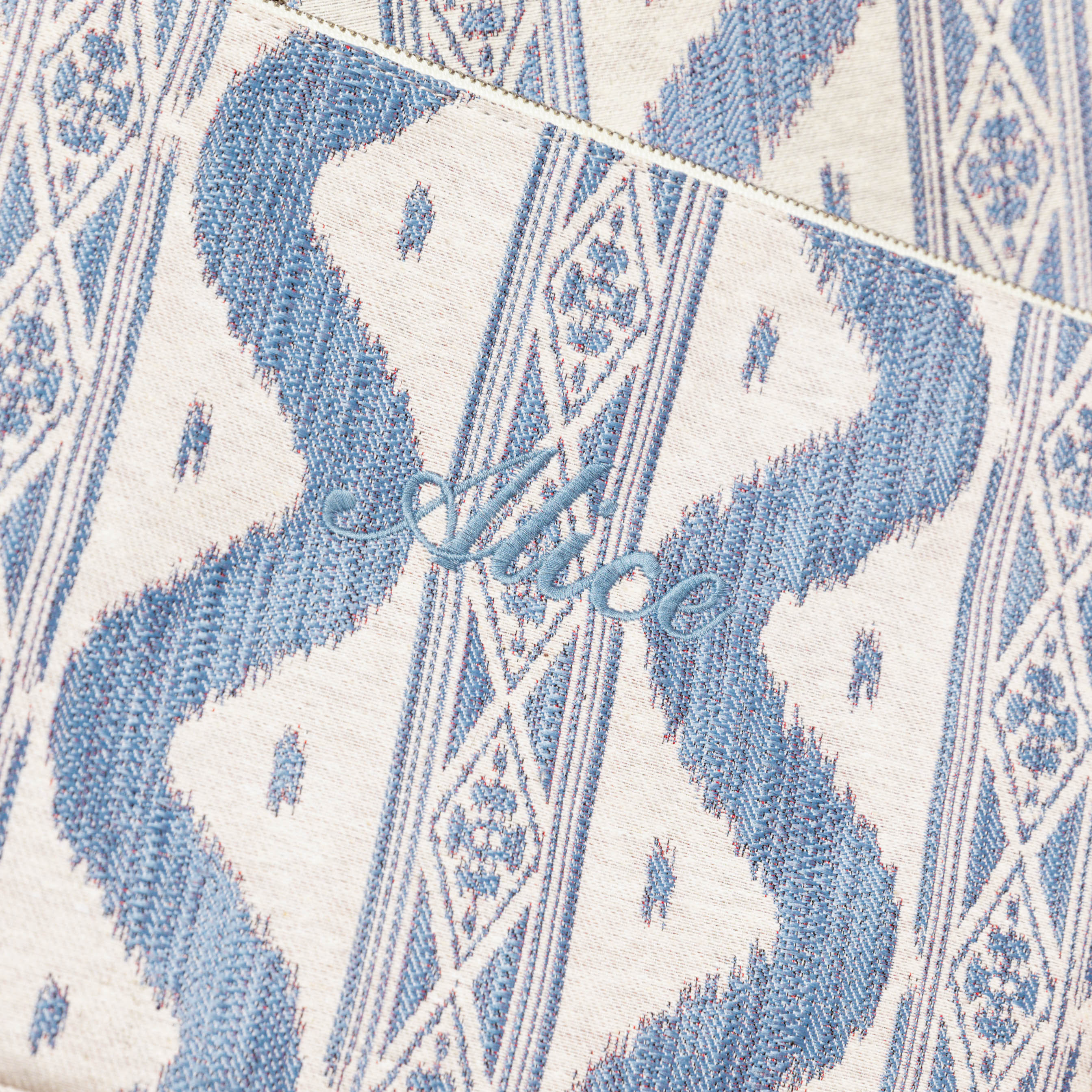 Add a touch of elegance to your outfit with the Blue Ikat Pochette, ideal for infusing your ensemble with the captivating charm of Ikat-inspired patterns and versatile style.