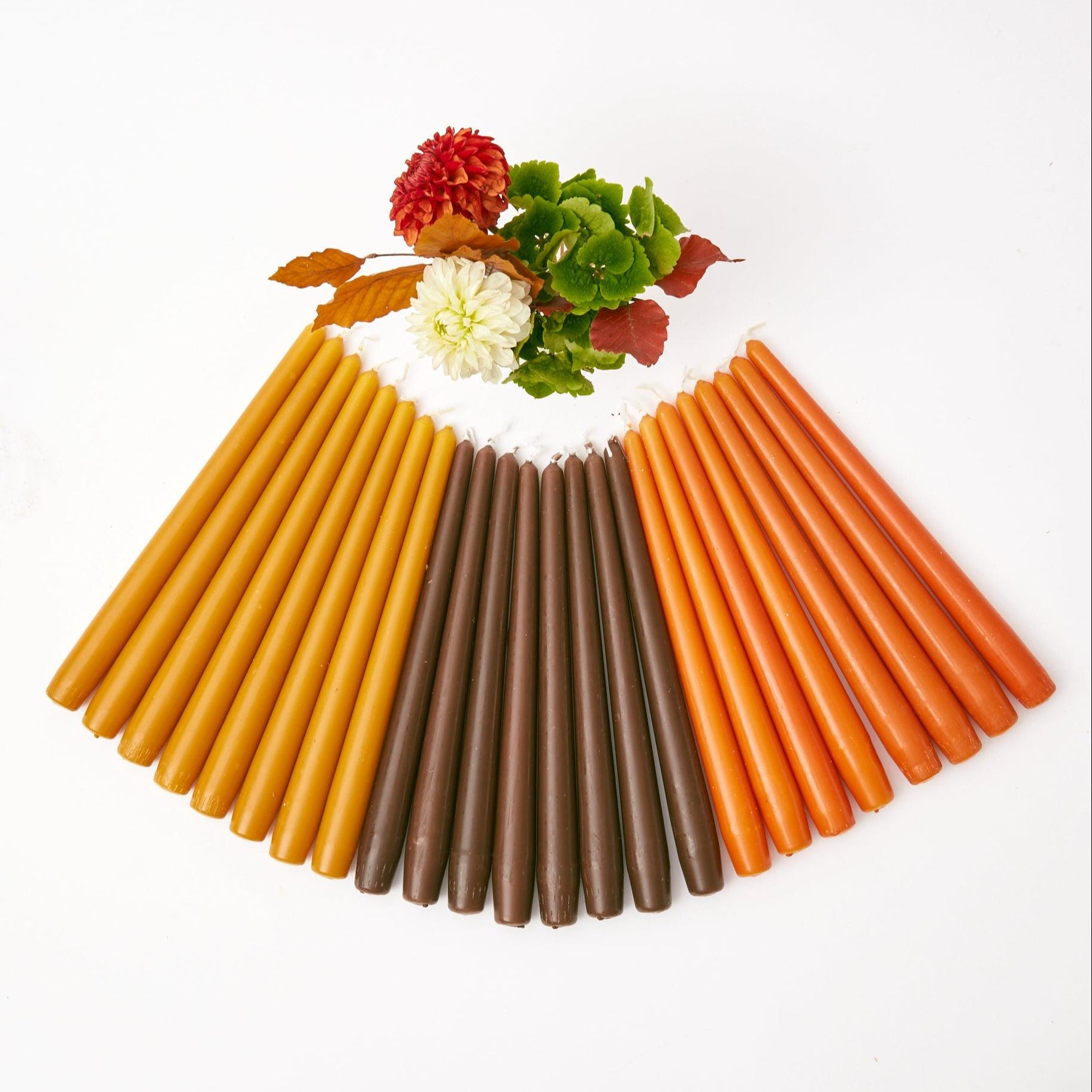 Enjoy the extended burn time and beauty of Chocolate Brown Candles, a delightful set of 18 for your home.