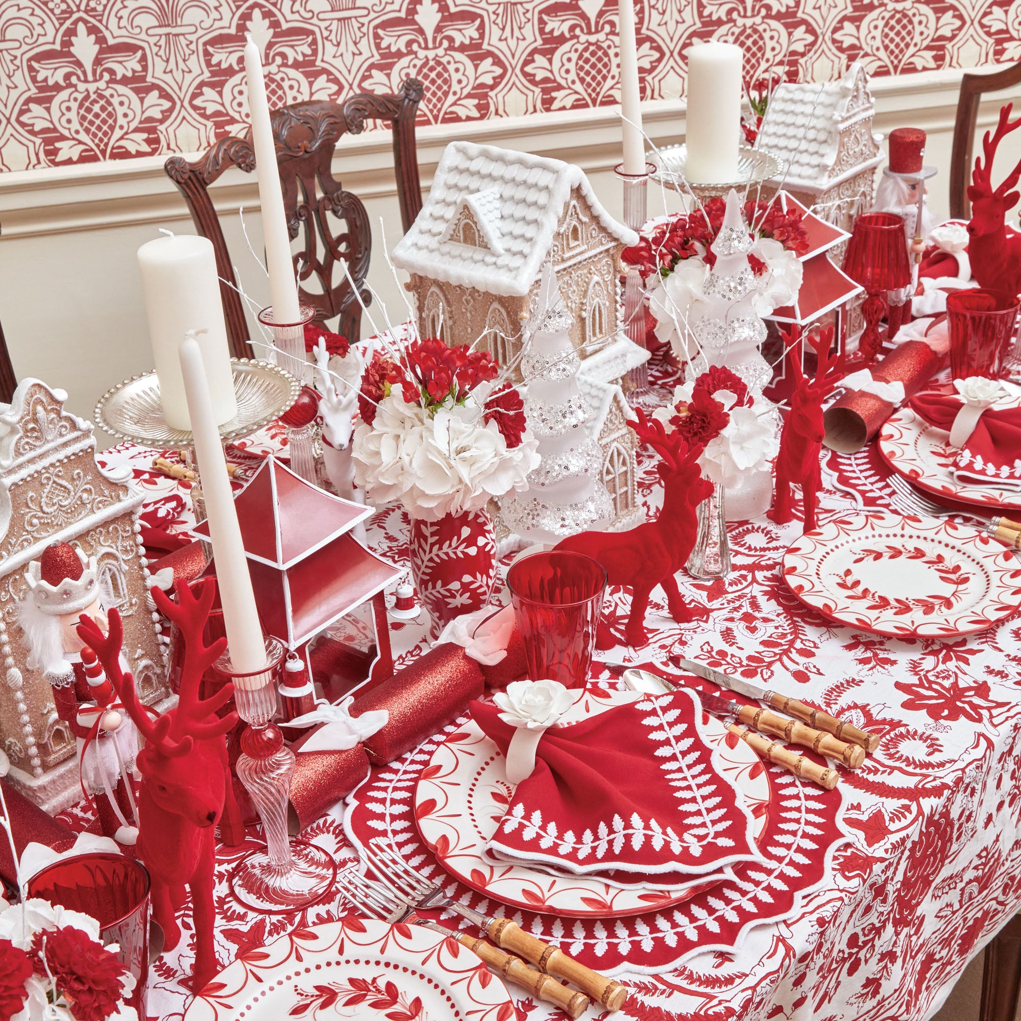 These Red Hand Painted Tole Bud Vases are perfect for showcasing your favorite blooms.