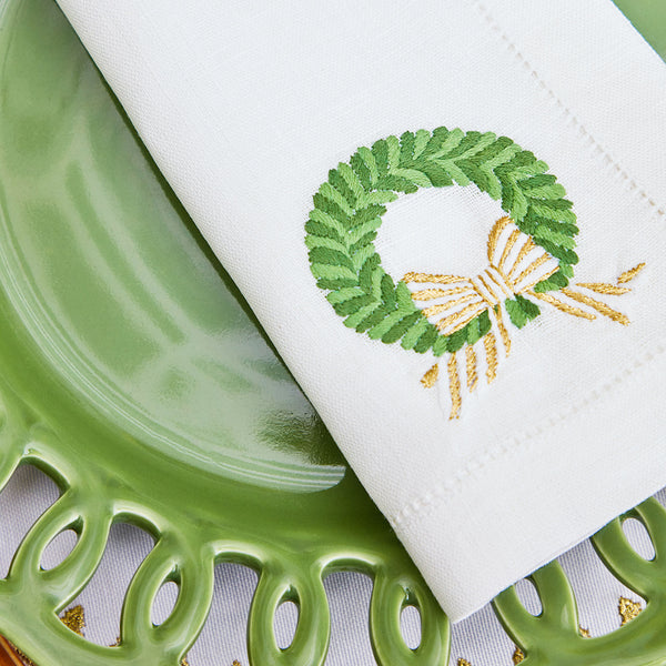 Add a touch of elegance to your festive dinner with these White Embroidered Wreath Napkins.