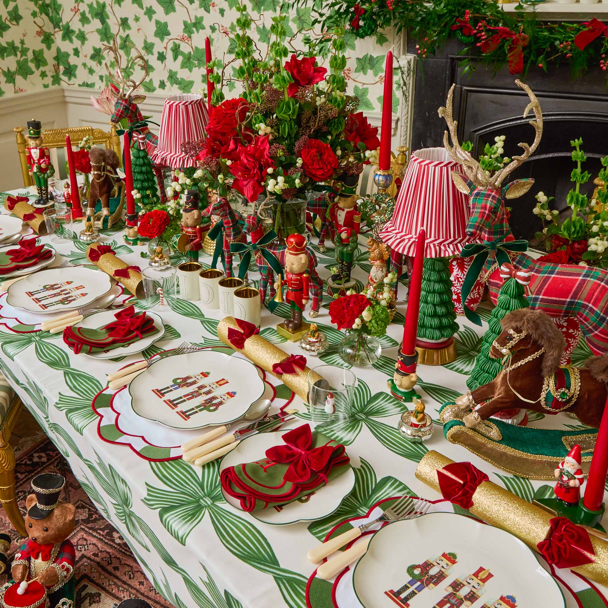 Decorative Christmas table setting with red, green, and gold elements.