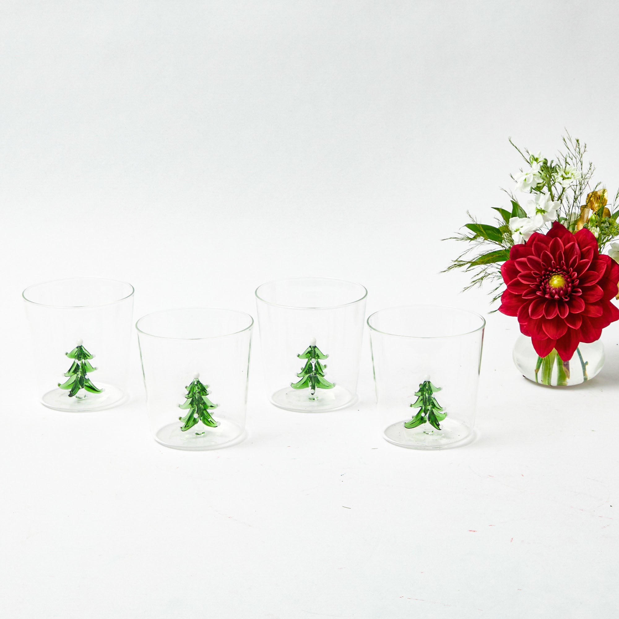 Elevate your holiday decor with Christmas Tree Glasses (Set of 4).
