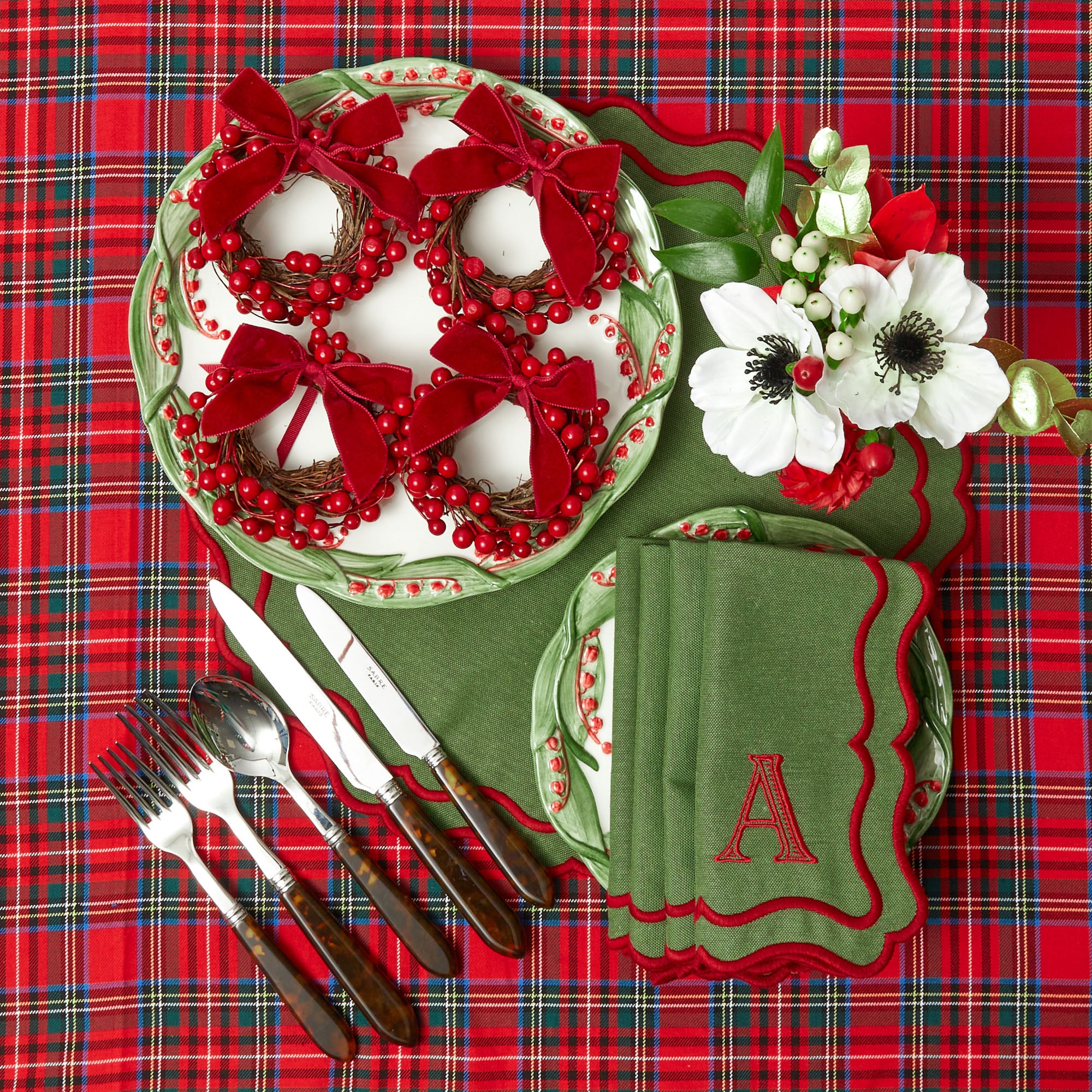 Create a warm and inviting holiday table with Katherine Green & Red Placemats & Napkins Set, an elegant combination for festive dining.