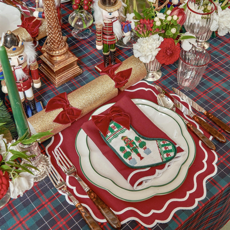 Elevate your Christmas table with the whimsical and enchanting Katherine Berry Red Placemats Set - a simple yet stylish statement of holiday sophistication.