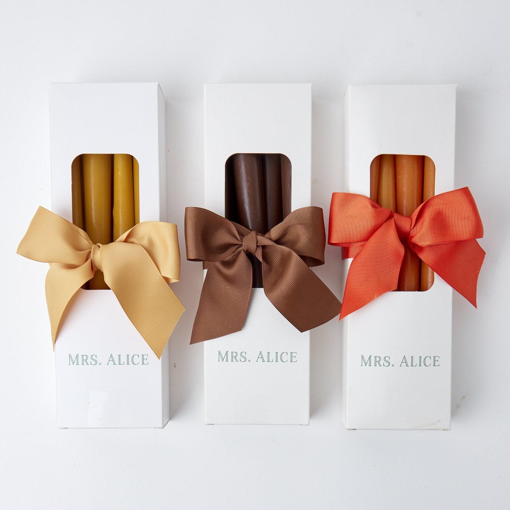 Decorate and illuminate with ease using this Set of 8 Mustard Candles, a perfect addition to any home.