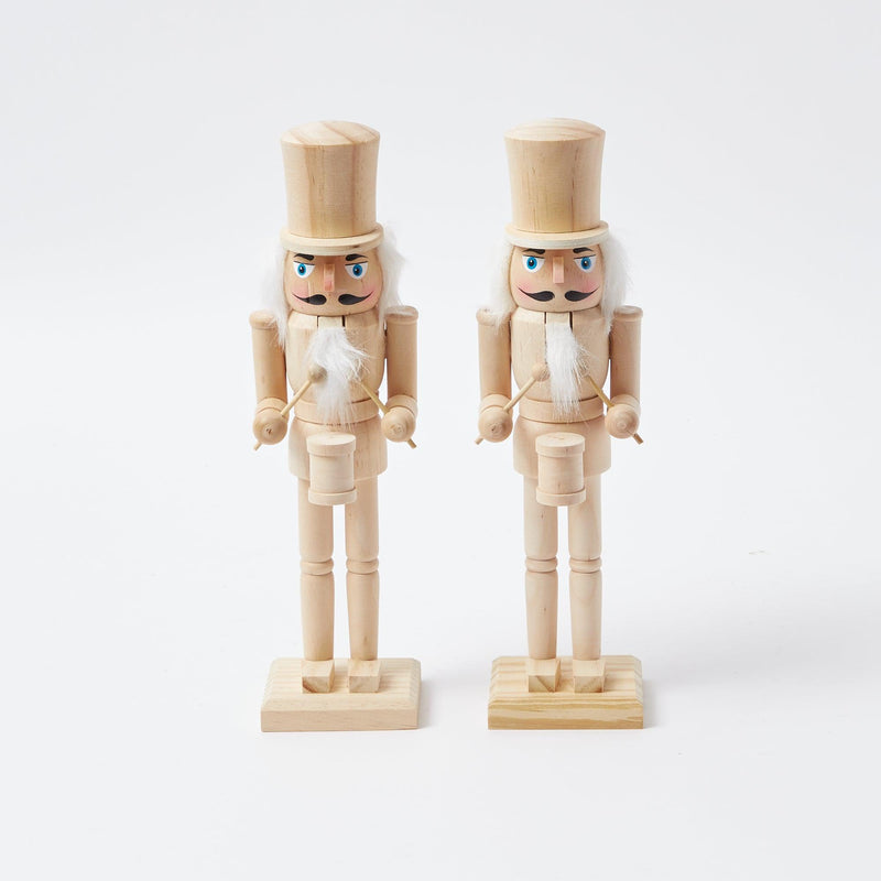Celebrate the beauty of the season with the Natural Wood Nutcracker Pair, a must-have for adding a touch of Christmas joy to your celebrations and infusing your decor with warmth.