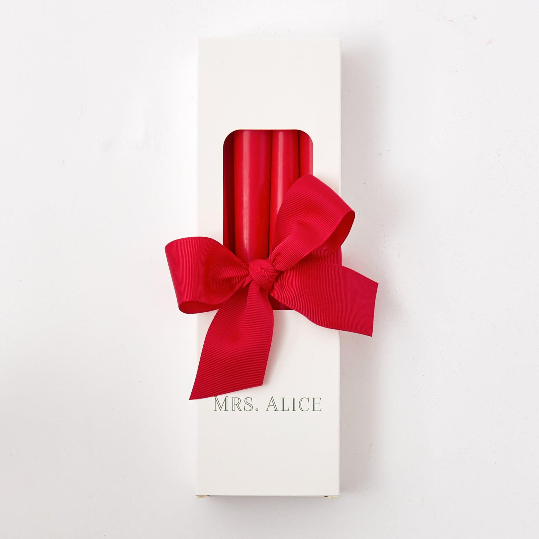 Elevate your ambiance with our Set of 8 Red Candles - a touch of fiery elegance for your decor.