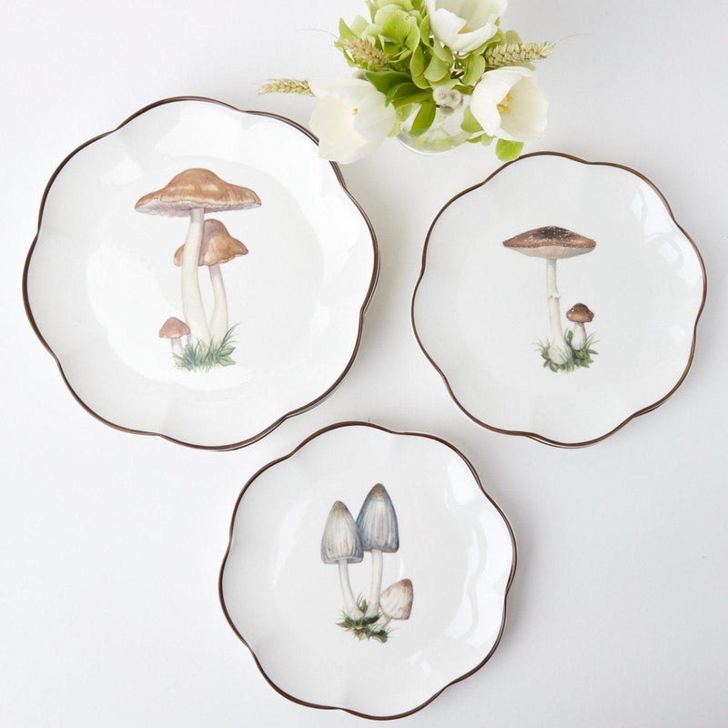 Integrate the subtle elegance of the grey Scalloped Mushroom Starter Plate into your table setting (Set of 17).