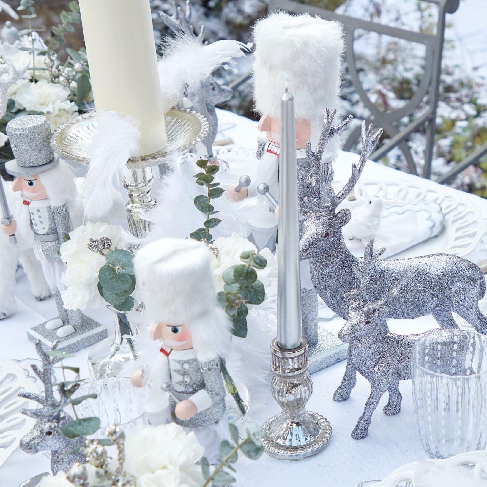 Add a cool and sophisticated glow to your space with our Silver Candles, perfect for a radiant atmosphere.