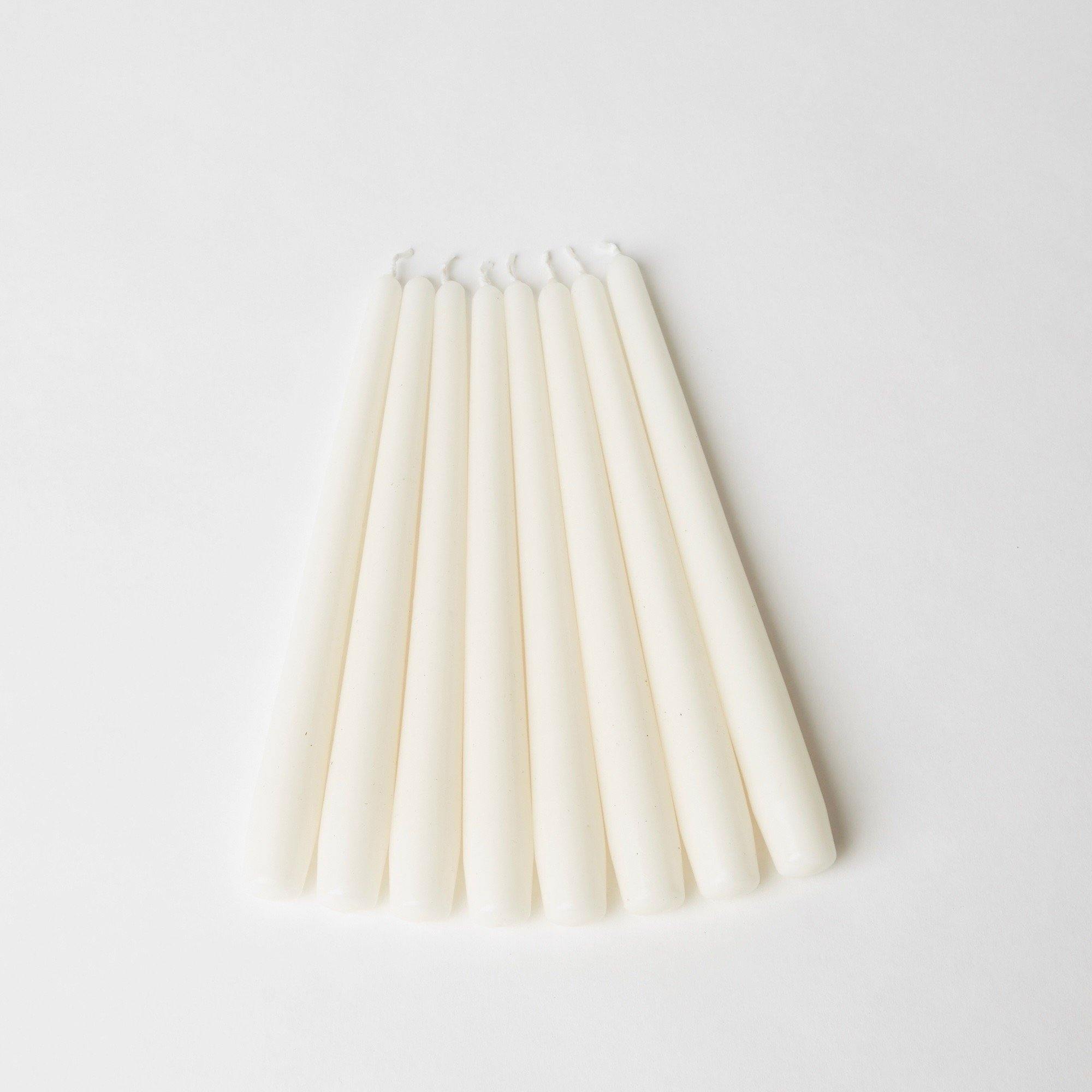 Elevate your surroundings with the serene charm of our Set of 8 Snow White Candles - a tribute to the beauty of pure simplicity.