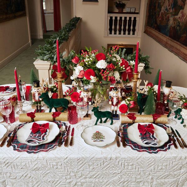 Add a touch of festive charm to your table setting with our Snowflake Applique Tablecloth.