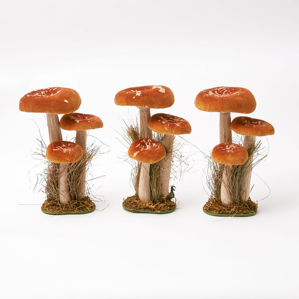 Elevate your decor with the charming Tall Orange Velvet Mushroom trio, adding a vibrant touch.