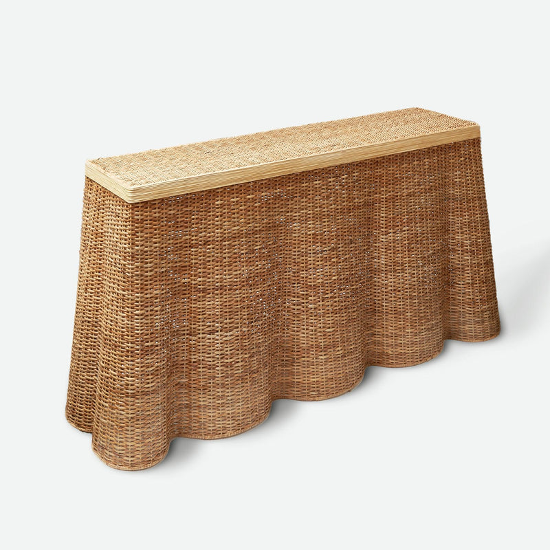 Enhance your living space with the playful and delightful Vivienne Rattan Scalloped Console Table - a stylish choice that adds a dash of coastal elegance to your decor.