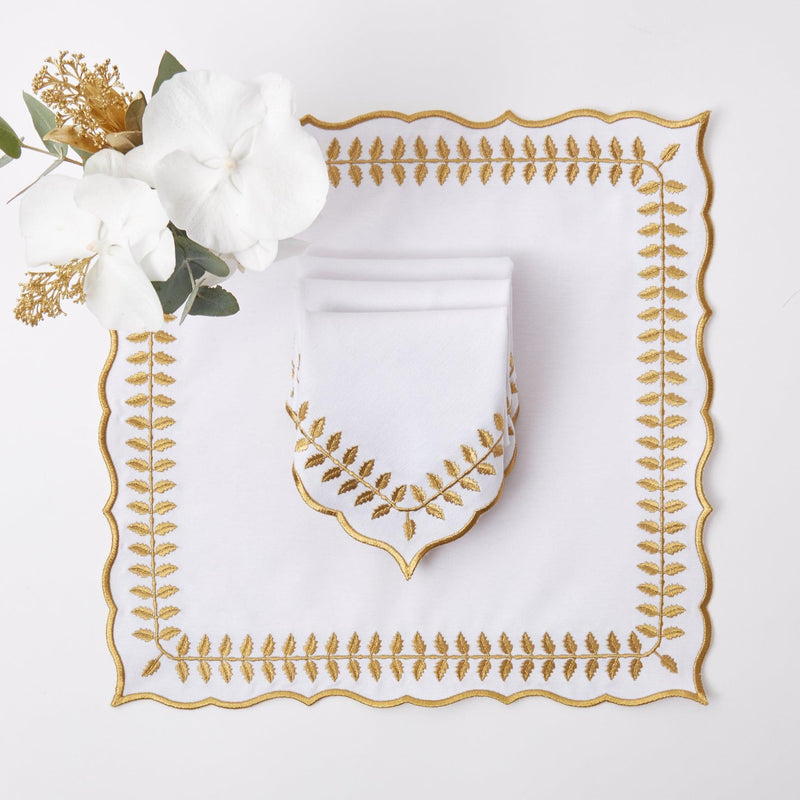 Elevate your dining table with the stylish and elegant White & Gold Laurel Napkins - a simple yet luxurious statement of refined taste.