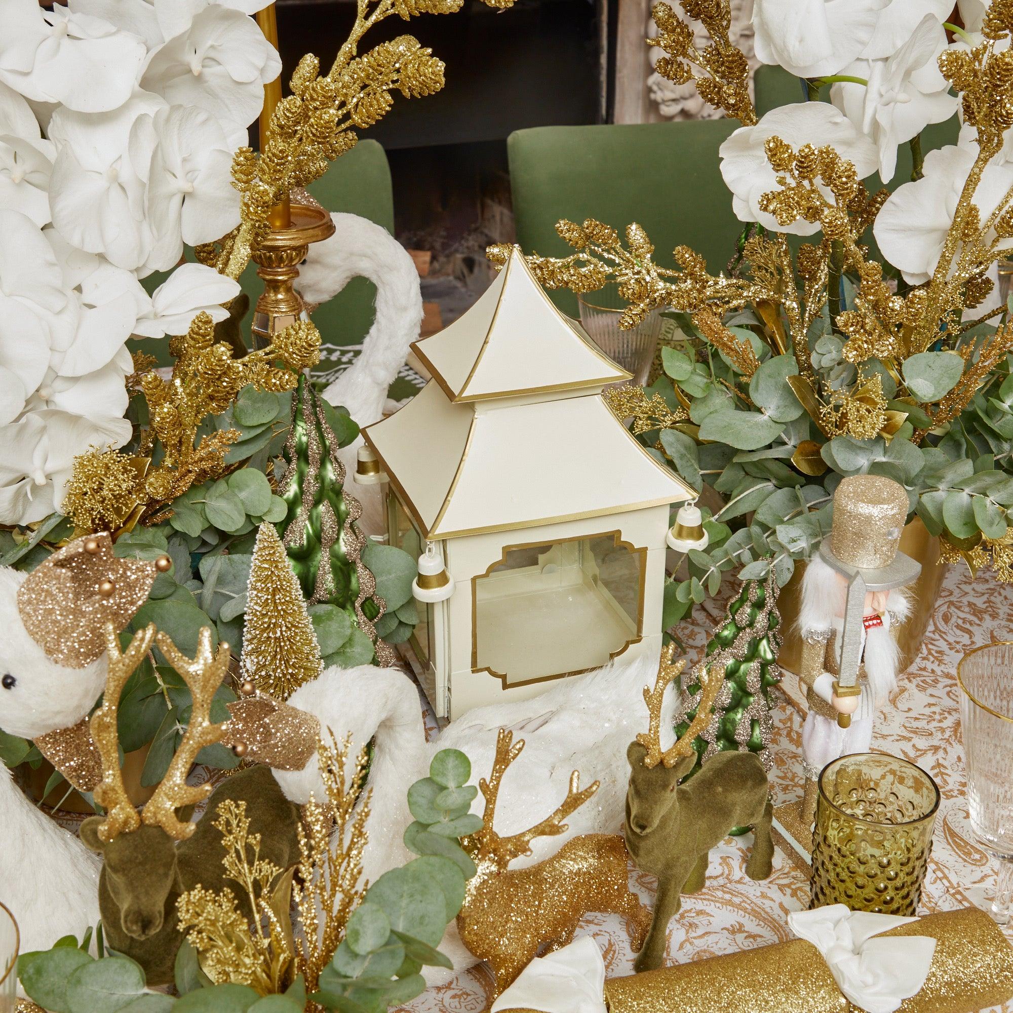 Create a serene ambiance with the White & Gold Pagoda Lantern - the ideal choice for adding a touch of elegance to your surroundings.