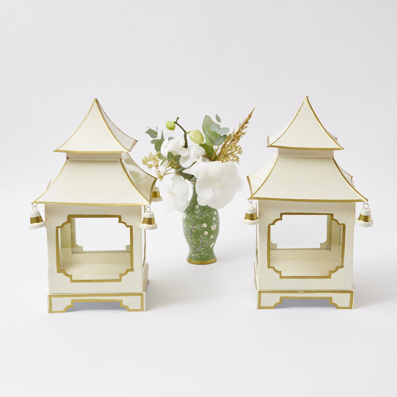 Make every space special with the White & Gold Pagoda Lantern - a delightful addition to your home decor.