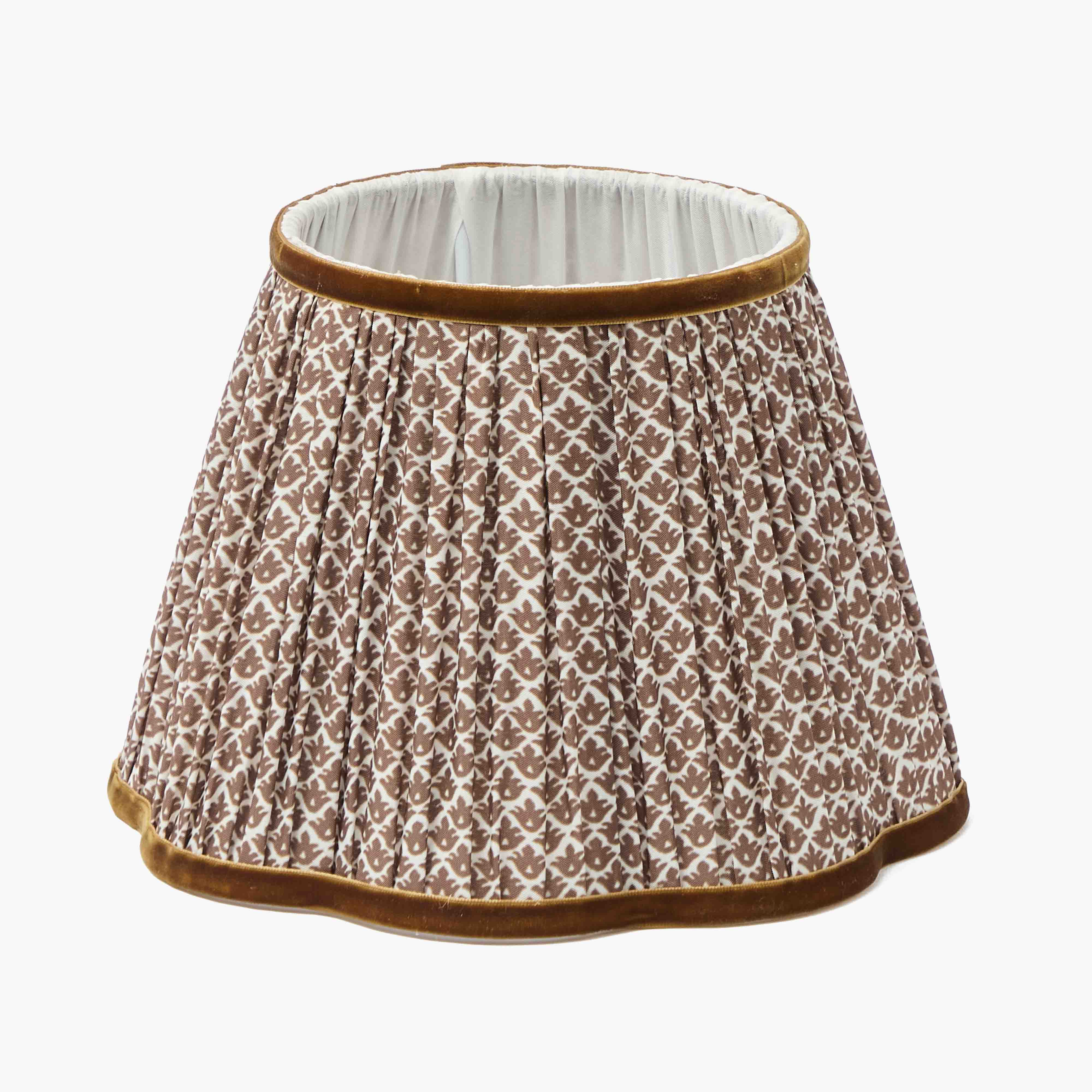 Patterned skirt with brown trim on a white background