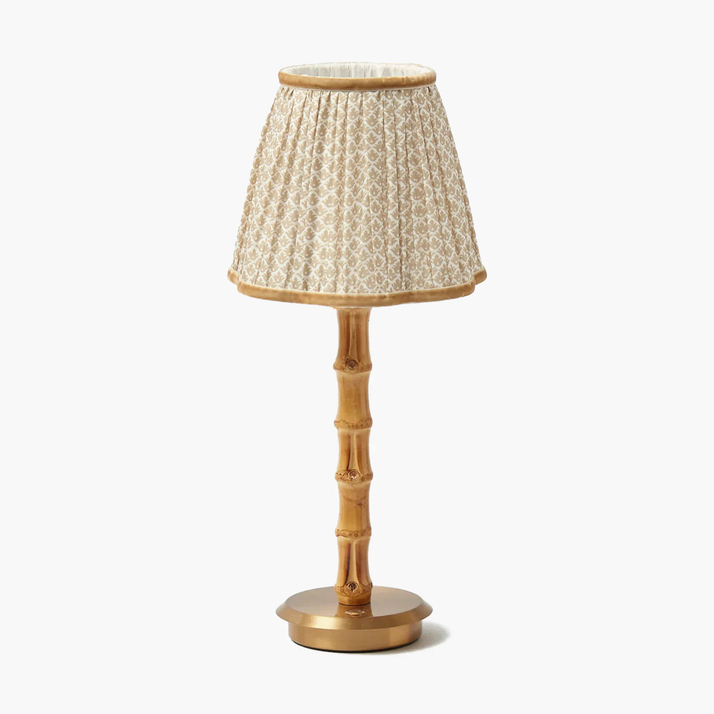 Table lamp with bamboo design and patterned shade on a white background