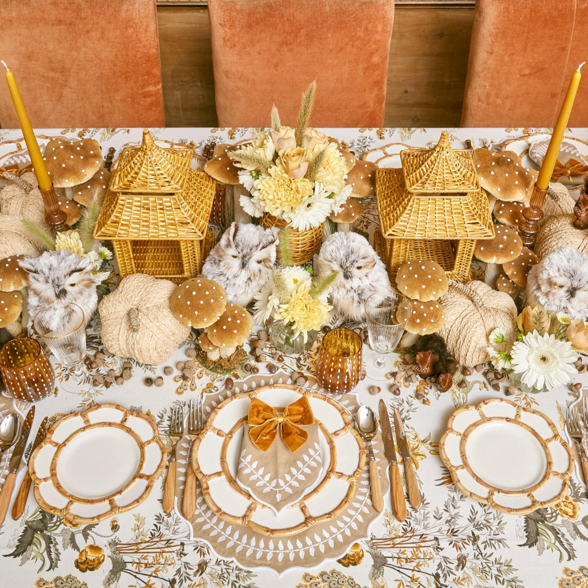 Create a cozy ambiance with Raffia Pumpkins.