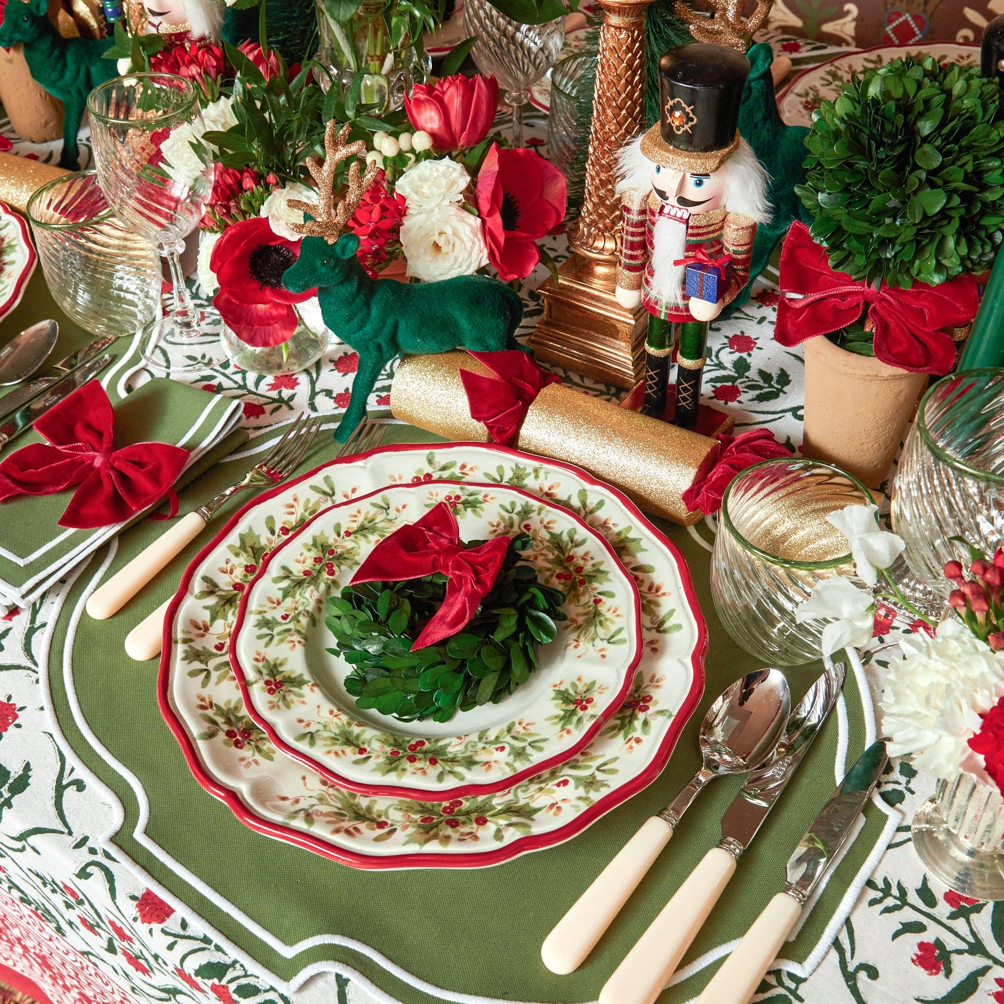 Turn your Christmas celebrations into a whimsical affair with the Red Ribboned Potted Boxwood Balls, a must-have for adding a touch of Christmas magic to your decorations and infusing your holiday decor with a warm and festive touch.