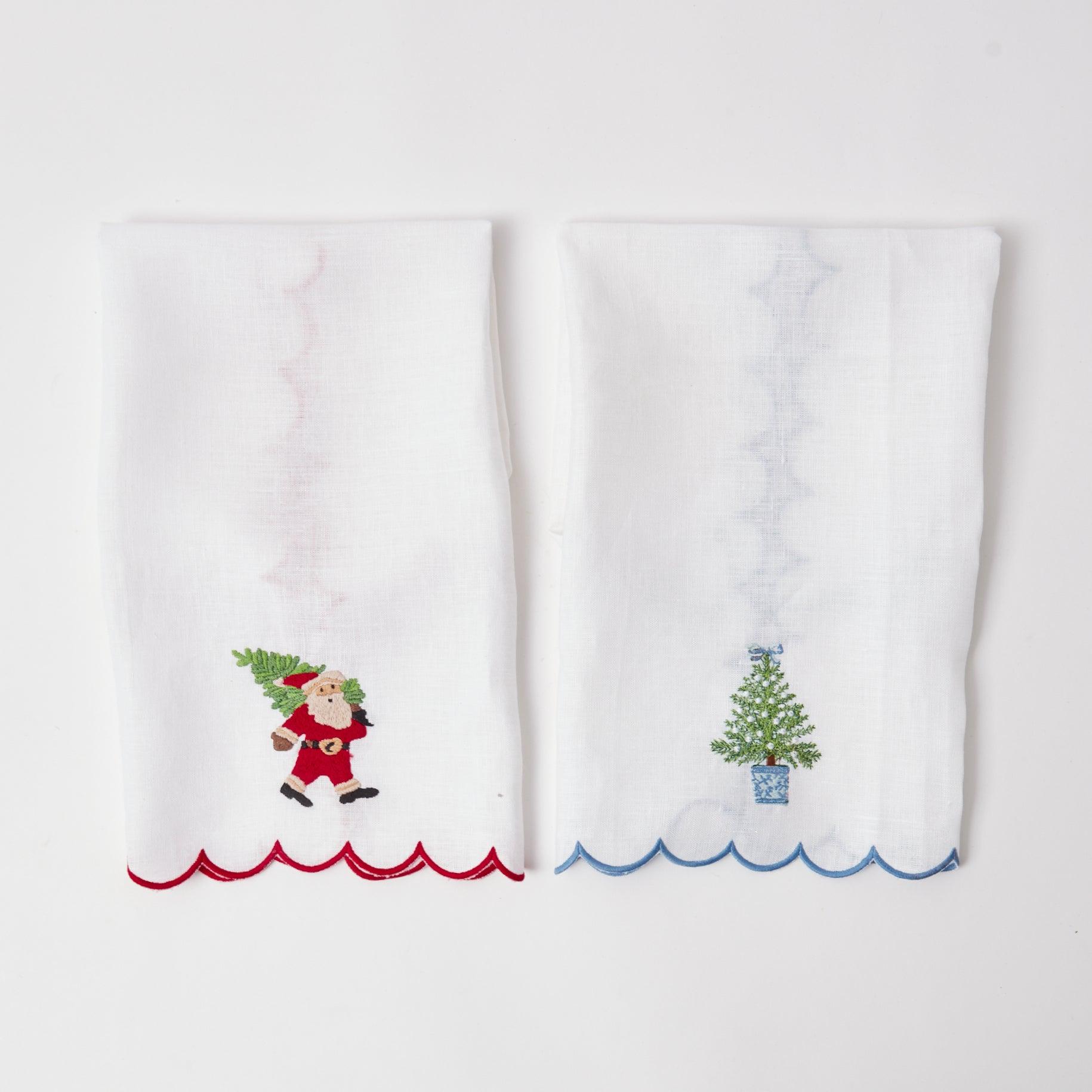 Enhance your Christmas decor with the playful charm of the Embroidered Christmas Tree Linen Hand Towel, designed to bring a touch of tradition and festivity to your holiday festivities.