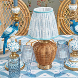 Set of three portable rattan lamps with rechargeable options.
