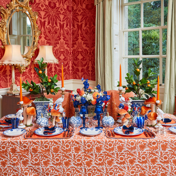 Tablecloth featuring elegant burnt orange hues with pheasant designs.