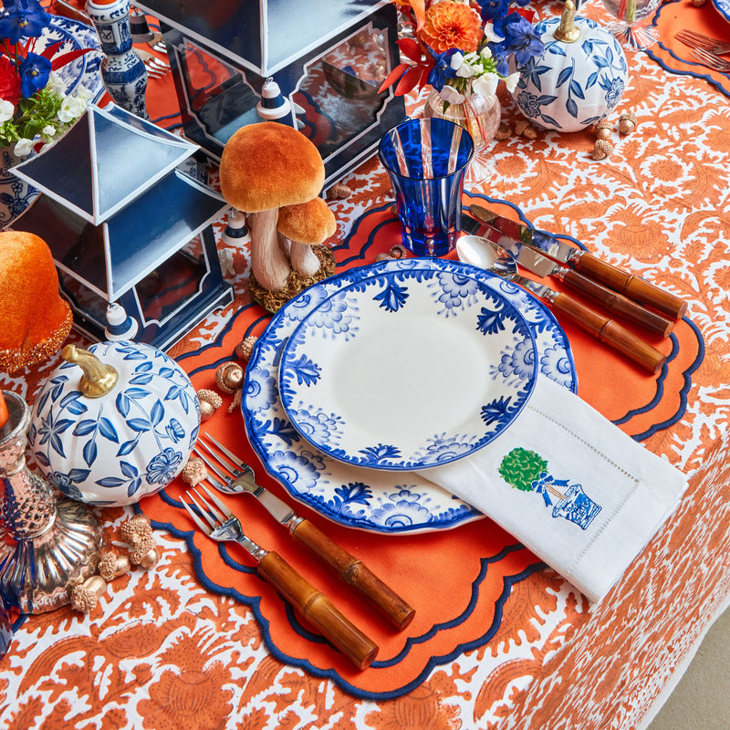 Coordinated set of Blue Deauville starter plates with sophisticated designs.