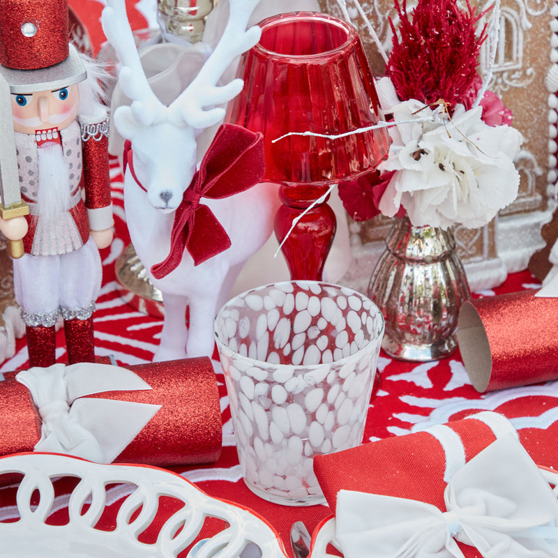 Add a touch of classic charm to your table setting with our set of 4 Dappled White Water Glasses.