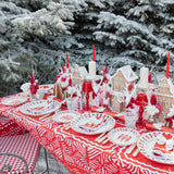 Add a touch of holiday enchantment to your dining settings with the Gretel Applique Red Tablecloth, ideal for infusing your Christmas meals with a touch of festive elegance.