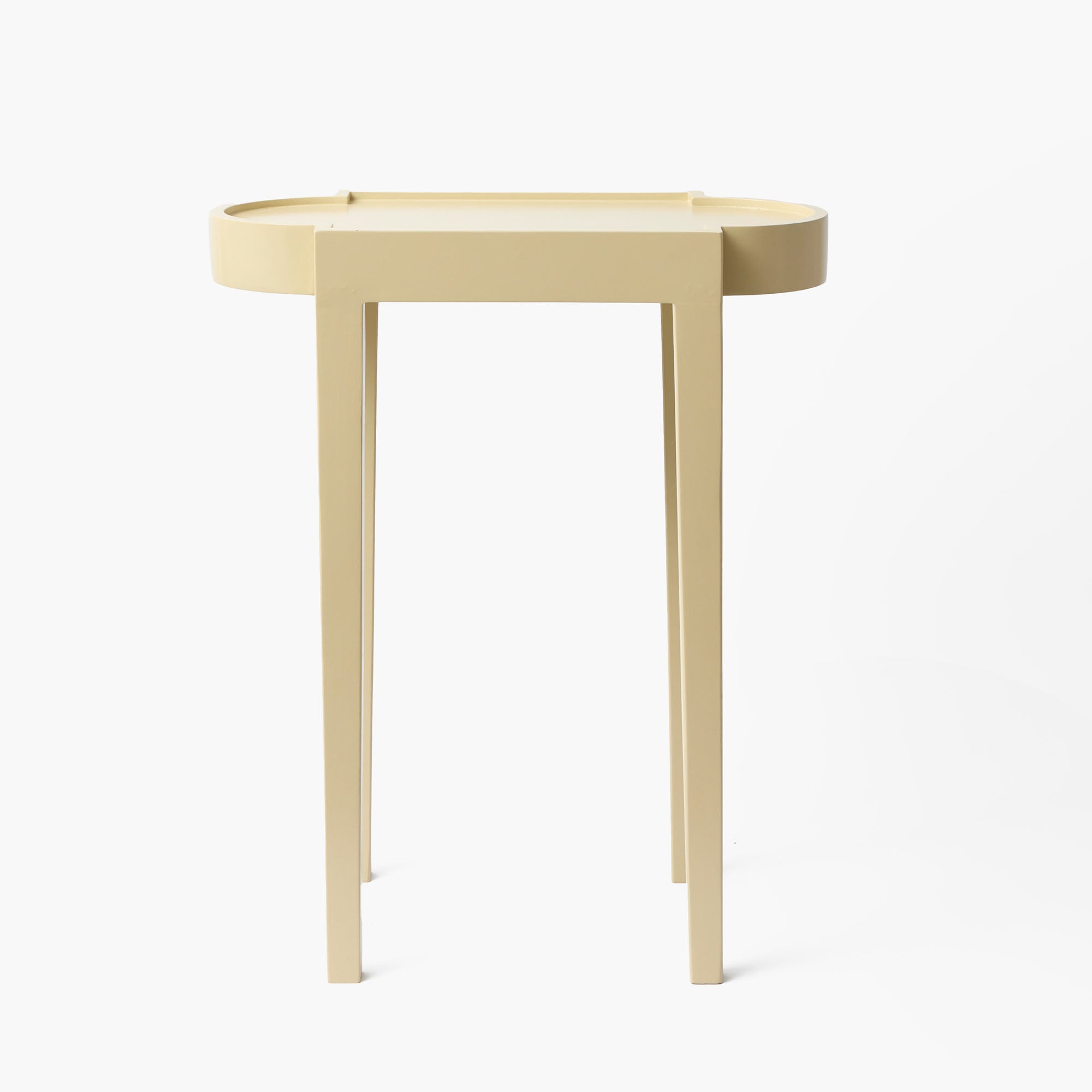 Beige side table on a white background