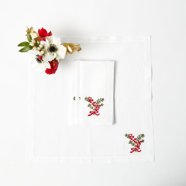 Elevate your dining experience with our Red Berry White Linen Napkins, a set of 4 that adds a touch of elegance to your holiday table setting.