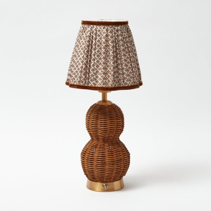 Create an ambiance that stands out with the Rattan Bardot Rechargeable Lamp, perfect for bringing an element of charm and the richness of the chocolate lampshade to your interior.