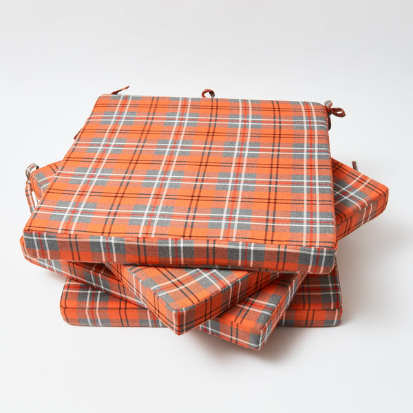 Set of four seat pad cushions featuring the classic Fife tartan pattern.