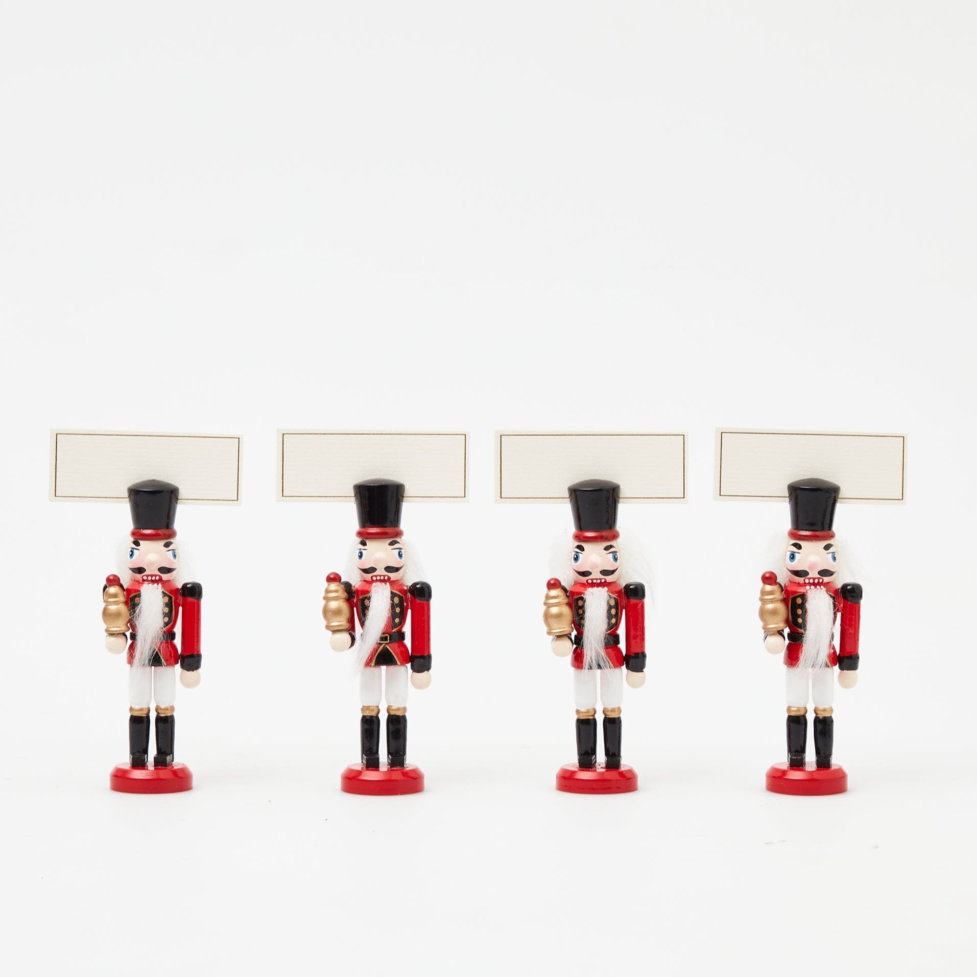 Set your holiday table with these charming Red Nutcracker Placecard Holders.