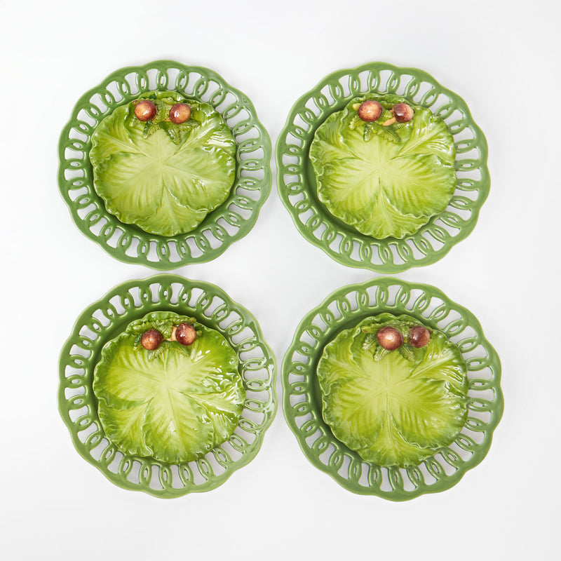 Collection of four plates featuring charming porcini mushroom and cabbage patterns.
