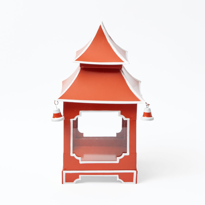 Burnt orange pagoda-style lantern for ambient lighting.