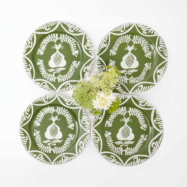 Set of 4 dinner plates featuring olive and pomegranate motifs.