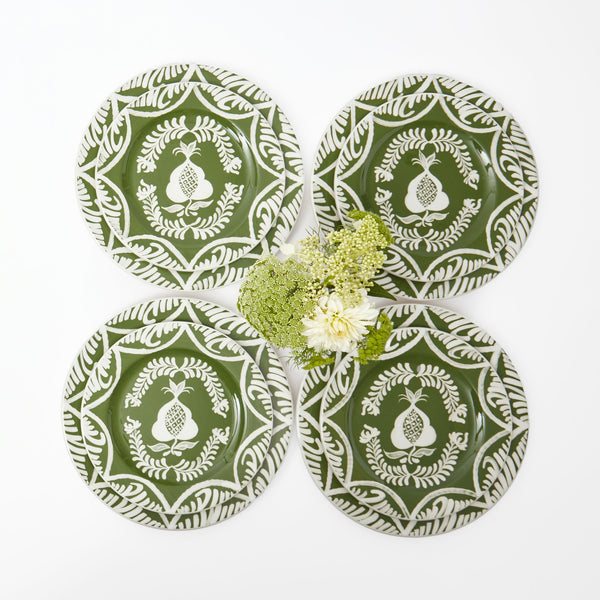 Set of 8 dinner and starter plates adorned with olive and pomegranate motifs.