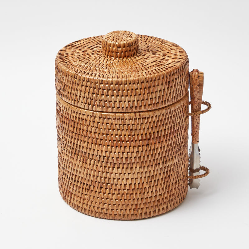 Ice bucket made of natural rattan for stylish chilling.