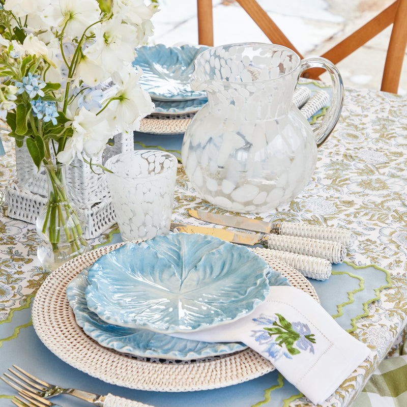Add a touch of timeless style to your table decor with the Dappled White Water Jug.