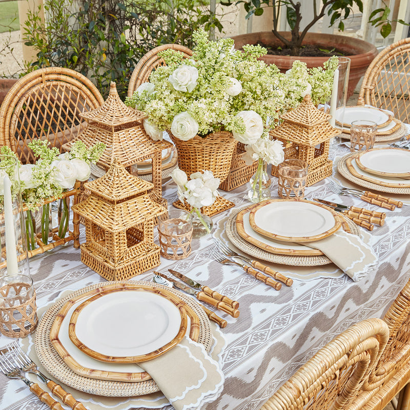 Add a touch of nature to your table with the Natural Rattan Charger Plates - a set of 4 woven wonders for a rustic and stylish ambiance.